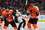 PHILADELPHIA - JANUARY 13:  Kimmo Timonen #44 and Braydon Coburn #5 of the Philadelphia Flyers defend against Sidney Crosby #87 of the Pittsburgh Penguins January 13, 2009 at Wachovia Center in Philadelphia, Pennsylvania.  (Photo by Jim McIsaac/Getty Images)
