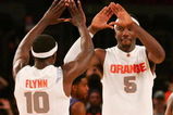 NEW YORK - NOVEMBER 23:  Donte' Greene #5 and Jonny Flynn #10 of the Syracuse Orange celebrate victory against the Washington Huskies during the NIT Season Tip-Off consolation match at Madison Square Garden November 23, 2007 in New York City.  (Photo by Chris McGrath/Getty Images)