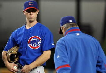 LOS ANGELES, CA - OCTOBER 04:  Rich Harden #40 of the Chicago Cubs waits for a meeting at the mound by manager Lou Piniella in the third inning while taking on the Los Angeles Dodgers in Game Three of the NLDS during the 2008 MLB playoffs on October 4, 2008 at Dodger Stadium in Los Angeles, California.  (Photo by Lisa Blumenfeld/Getty Images)