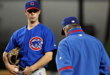 LOS ANGELES, CA - OCTOBER 04:  Rich Harden #40 of the Chicago Cubs waits for a meeting at the mound by manager Lou Piniella in the third inning while taking on the Los Angeles Dodgers in Game Three of the NLDS during the 2008 MLB playoffs on October 4, 2008 at Dodger Stadium in Los Angeles, California.  (Photo by Lisa Blumenfeld/Getty Images)