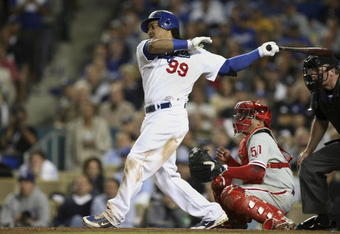 LOS ANGELES, CA - OCTOBER 13:  Manny Ramirez #99 of the Los Angeles Dodgers at bat against the Philadelphia Phillies in Game Four of the National League Championship Series during the 2008 MLB playoffs on October 13, 2008 at Dodger Stadium in Los Angeles, California.  (Photo by Jed Jacobsohn/Getty Images)