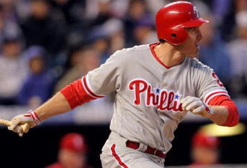 DENVER - APRIL 11:  Chase Utley #26 of the Philadelphia Phillies takes an at abt against the Colorado Rockies during MLB action at Coors Field on April 11, 2009 in Denver, Colorado. The Phillies defeated the Rockies 8-4.  (Photo by Doug Pensinger/Getty Images)