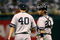 TAMPA, FL - JULY 14:  Starting pitcher Chien-Ming Wang #40 of the New York Yankees talks with catcher Jorge Posada #20 after Wang gave up three runs in the first inning against the Tampa Bay Devil Rays at Tropicana Field on July 14, 2007 in St. Petersburg, Florida.  (Photo by Doug Benc/Getty Images)