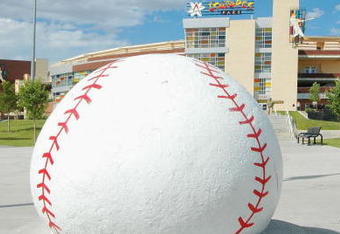 ALBUQUERQUE, NM ? JUNE 13: A giant concrete baseball sits at the entrance of Isotope Park for the All-American Baseball Game on June 13, 2005 in Albuquerque, New Mexico. The All-American Baseball Game is presented by PlayStation and features the nation?s top prep baseball players in an annual East versus West showdown. This year?s game featured four 1st Round draft picks from the 2005 Major League Baseball Draft. SportsLink, Inc. founded and produces the All-American Baseball Game. (Photo by Steve Snowden/Getty Images)