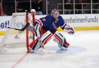 NEW YORK - FEBRUARY 11:  Henrik Lundqvist #30 of the New York Rangers defends the net during the game against the Washington Capitals on February 11, 2009 at Madison Square Garden in New York, New York. (Photo by Nick Laham/Getty Images)