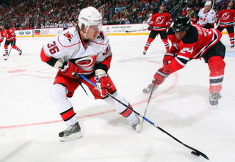 NEWARK, NJ - APRIL 11:  Jussi Jokinen #36 of the Carolina Hurricanes skates against the New Jersey Devils at the Prudential Center on April 11, 2009 in Newark, New Jersey. The Devils defeated the Hurricanes 3-2.  (Photo by Jim McIsaac/Getty Images)