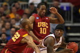MINNEAPOLIS - MARCH 20:  Corey Raji #11 of the Boston College Eagles looks to pass the ball as he is double teamed by Taj Gibson #22 and DeMar DeRozan #10 of the USC Trojans during the first round of the NCAA Division I Men's Basketball Tournament at the Hubert H. Humphrey Metrodome on March 20, 2009 in Minneapolis, Minnesota.  (Photo by Jonathan Daniel/Getty Images)