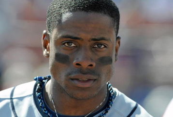 DUNEDIN, FL - FEBRUARY 27 :  Outfielder Curtis Granderson of the Detroit Tigers watches play against the Toronto Blue Jays February 27, 2009 at Dunedin Stadium in Dunedin, Florida.  (Photo by Al Messerschmidt/Getty Images)