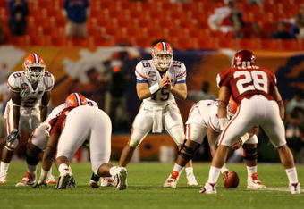 MIAMI - JANUARY 08:  Tim Tebow #15 of the Florida Gators awaits the snap in the shotgun formation against the Oklahoma Sooners during the FedEx BCS National Championship game at Dolphin Stadium on January 8, 2009 in Miami, Florida.  (Photo by Doug Benc/Getty Images)