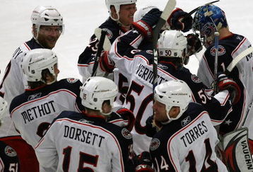CHICAGO - APRIL 08: The Columbus Blue Jackets celebrate a win over the Chicago Blackhawks by mobbing goaltender Steve Mason #1 (R) on April 8, 2009 at the United Center in Chicago, Illinois. The Blue Jackets defeated the Blackhawks 4-3 in a shootout. (Photo by Jonathan Daniel/Getty Images)