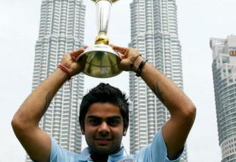 KUALA LUMPUR, MALAYSIA - MARCH 3 : Virat Kohli of India poses with the ICC U19 Cricket World Cup at the Kuala Lumpur Twin Towers on March 3, 2008 in Kuala Lumpur, Malaysia. (Photo by Stanley Chou/Getty Images)
