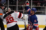 NEW YORK - APRIL 13: Sean Avery #16 of the New York Rangers tries to screen Martin Brodeur #30 of the New Jersey Devils during game three of the 2008 NHL Eastern Conference Quarterfinals on April 13, 2008 at Madison Square Garden in New York City.  (Photo by Jim McIsaac/Getty Images)