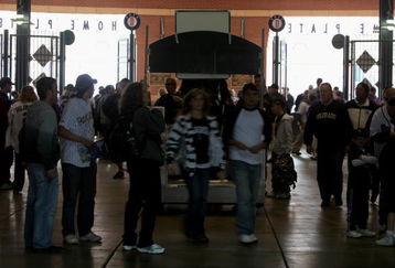 DENVER - APRIL 10:  Fans enter the stadium as the Philadelphia Phillies face the Colorado Rockies during MLB action on Opening Day at Coors Field on April 10, 2009 in Denver, Colorado. The Rockies defeated the Phillies 10-3.  (Photo by Doug Pensinger/Getty Images)