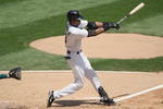 CHICAGO - JULY 06:  Alexei Ramirez #10 of the Chicago White Sox bats against the Oakland Athletics on July 6, 2008 at U.S. Cellular Field in Chicago, Illinois. The White Sox defeated the Athletics 4-3. (Photo by Jonathan Daniel/Getty Images) 