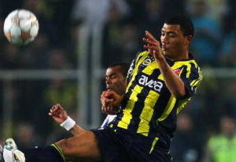 ISTANBUL, TURKEY - APRIL 02:  Colin Kazim-Richards of Fenerbahce and Ashley Cole of Chelsea battle for the ball during the UEFA Champions League Quarter Final 1st Leg match between Fenerbache and Chelsea at the Sukru Saracoglu Stadium on April 2, 2008 in Istanbul, Turkey.  (Photo by Richard Heathcote/Getty Images)