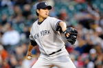 BALTIMORE - APRIL 8:  Chien-Ming Wang #40 of the New York Yankees pitches against the Baltimore Orioles at Camden Yards April 8, 2009 in Baltimore, Maryland.  (Photo by Greg Fiume/Getty Images)