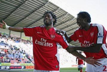 WIGAN, ENGLAND - APRIL 11:  Alexandre Song of Arsenal celebrates scoring the fourth goal with Emmanuel Adebayor during the Barclays Premier League match between Wigan Athletic and Arsenal at The JJB Stadium on April 11, 2009 in Wigan, England.  (Photo by Laurence Griffiths/Getty Images)