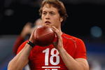 INDIANAPOLIS, IN - FEBRUARY 22:  Quarterback Matthew Stafford of USC passes the football during the NFL Scouting Combine presented by Under Armour at Lucas Oil Stadium on February 22, 2009 in Indianapolis, Indiana. (Photo by Scott Boehm/Getty Images)