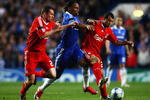 LONDON, ENGLAND - APRIL 14:  Jamie Carragher (R) and Javier Mascherano of Liverpool challenge Didier Drogba of Chelsea during the UEFA Champions League Quarter Final Second Leg match between Chelsea and Liverpool at Stamford Bridge on April 14, 2009 in London, England.  (Photo by Ryan Pierse/Getty Images)