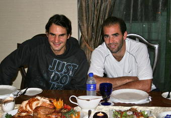 KUALA LUMPUR, MALAYSIA - NOVEMBER 22: In this handout image provided by the ATP tennis star Roger Federer, left, takes time out from the Federer vs. Sampras Asian exhibition tour to host Pete Sampras for a traditional American Thanksgiving on November 22, 2007 in Kuala, Malaysia.  (Photo by ATP Tennis via Getty Images)