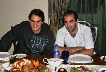 KUALA LUMPUR, MALAYSIA - NOVEMBER 22: In this handout image provided by the ATP tennis star Roger Federer, left, takes time out from the Federer vs. Sampras Asian exhibition tour to host Pete Sampras for a traditional American Thanksgiving on November 22, 2007 in Kuala, Malaysia.  (Photo by ATP Tennis via Getty Images)