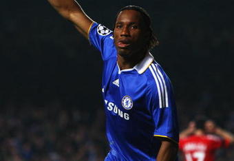 LONDON - APRIL 14:  Didier Drogba of Chelsea celebrates the own goal scored by Pepe Reina of Liverpool during the UEFA Champions League Quarter Final Second Leg match between Chelsea and Liverpool at Stamford Bridge on April 14, 2009 in London, England.  (Photo by Jamie McDonald/Getty Images)
