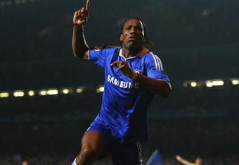 LONDON - APRIL 14:  Didier Drogba of Chelsea celebrates the own goal scored by Pepe Reina of Liverpool during the UEFA Champions League Quarter Final Second Leg match between Chelsea and Liverpool at Stamford Bridge on April 14, 2009 in London, England.  (Photo by Jamie McDonald/Getty Images)