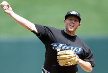 KANSAS CITY, MO - APRIL 27: Jesse Litsch #51 of the Toronto Blue Jays delivers a pitch during the MLB game against the Kansas City Royals on April 27, 2008 at Kauffman Stadium in Kansas City, Missouri. (Photo by G. Newman Lowrance/Getty Images)