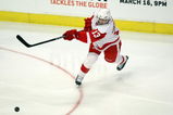 CHICAGO - APRIL 12:  Pavel Datsyuk #13 of the Detroit Red Wings attempts a shot on goal against the Chicago Blackhawks at the United Center on April 12, 2009 in Chicago, Illinois.  (Photo by Jonathan Daniel/Getty Images)