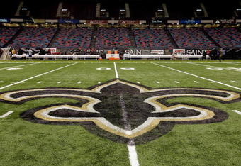 NEW ORLEANS - SEPTEMBER 25:  An interior view of the field showing the New Orleans Saints logo, a fleur-de-lis, in the newly refurbished Superdome prior to the Monday Night Football game between the Atlanta Falcons and the New Orleans Saints on September 25, 2006 at the Superdome in New Orleans, Louisiana.  Tonight's game marks the first time since Hurricane Katrina struck last August, that the Superdome, which served as a temporary shelter to thousands of stranded victims in the wake of Katrina, has played host to an NFL game.  (Photo by Ronald Martinez/Getty Images)