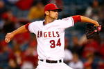 ANAHEIM, CA - APRIL 08:  Nick Adenhart #34 of the Los Angeles Angels of Anaheim throws a pitch against the Oakland Athletics at Angel Stadium on April 8, 2009 in Anaheim, California. The Athletics defeated the Angels 6-4.  (Photo by Jeff Gross/Getty Images)