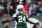 EAST RUTHERFORD, NJ - DECEMBER 14:  Darrelle Revis #24 of the New York Jets celebrates making a game saving interception in the closing minutes of regulation preserving a 31-27 win against the Buffalo Bills during their game on December 14, 2008 at Giants Stadium in East Rutherford, New Jersey.  (Photo by Al Bello/Getty Images)