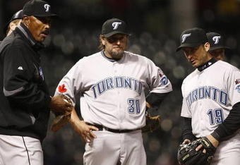 CLEVELAND - APRIL 10:  Cito Gaston #43 of the Toronto Blue Jays talks to his team on the mound against the Cleveland Indians in the eighth inning April 10, 2009 at Progressive Field in Cleveland, Ohio.  (Photo by Matt Sullivan/Getty Images)