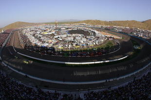 PHOENIX - APRIL 22:  Greg Biffle drives the #16 Subway/National Guard Ford in the lead during the NASCAR Nextel Cup Series SUBWAY Fresh 500 on April 22, 2006 at the Phoenix International Speedway in Phoenix, Arizona. (Photo by Lisa Blumenfeld/Getty Images)