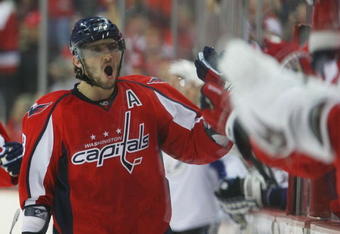 WASHINGTON - MARCH 27: Alex Ovechkin #8 of the Washington Capitals celebrates a Caps goal against the Tampa Bay Lightning on March 27, 2009 at the Verizon Center in Washington, D.C. (Photo by Bruce Bennett/Getty Images)