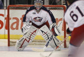 DETROIT, MI - MARCH 7:  Steve Mason #1 of the Columbus Blue Jackets faces a shot from teammate Rick Nash #61 in the warm-up prior to a game against the Detroit Red Wings on March 7, 2009 at Joe Louis Arena in Detroit, Michigan. (Photo by Claus Andersen/Getty Images)
