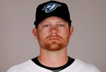 DUNEDIN, FL - FEBRUARY 23:  Adam Lind #26 of the Toronto Blue Jays poses during photo day at the Bobby Mattick Training Center at Englebert Complex on February 23, 2009 in Dunedin, Florida.  (Photo by J. Meric/Getty Images)