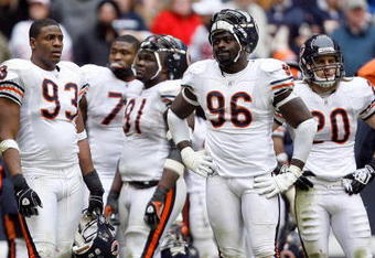 HOUSTON - DECEMBER 28:  Alex Brown #96 of the Chicago Bears reacts to a video ruling negating a fumble recovery with his teammates during the second half against the Houston Texans at the Reliant Stadium December 28, 2008 in Houston, Texas.  The Bears lost 31-24, failing to make the playoffs.  (Photo by Harry How/Getty Images)