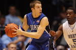CHAPEL HILL, NC - MARCH 8:  Greg Paulus #3 of the Duke Blue Devils posts up against Ty Lawson #5 of the North Carolina Tar Heels during the game at the Dean E. Smith Center on March 8, 2009 in Chapel Hill, North Carolina. (Photo by Streeter Lecka/Getty Images)