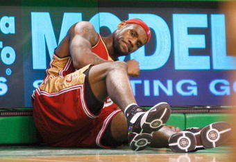 BOSTON, MA - FEBRUARY 27:   LeBron James #23 of the Cleveland Cavaliers reacts after suffering an in injury against the Boston Celtics at the TD Banknorth Garden on February 27, 2008 in Boston, Massachusetts. NOTE TO USER: User expressly acknowledges and agrees that, by downloading and/or using this Photograph, user is consenting to the terms and conditions of the Getty Images License Agreement.  (Photo by Jim Rogash/Getty Images)
