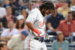 ATLANTA - APRIL 10: Outfielder Lastings Milledge #85 of Washington Nationals grimmaces after he is hit by an inside pitch against the Atlanta Braves April 10, 2009 in Atlanta, Georgia.  (Photo by Al Messerschmidt/Getty Images) 