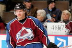 DENVER - FEBRUARY 08:  Karlis Skrastins #3 of the Colorado Avalanche warms up during pre-game skate while fans display a sign in the background as he prepares to break an NHL record as he will skate in his 487th consecutive game, the most by a defenseman, as the Avalanche host the Atlanta Thrashers on February 8, 2007 at the Pepsi Center in Denver, Colorado.  (Photo by Doug Pensinger/Getty Images)