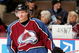 DENVER - FEBRUARY 08: Karlis Skrastins #3 of the Colorado Avalanche warms up during pre-game skate while fans display a sign in the background as he prepares to break an NHL record as he will skate in his 487th consecutive game, the most by a defenseman, as the Avalanche host the Atlanta Thrashers on February 8, 2007 at the Pepsi Center in Denver, Colorado. (Photo by Doug Pensinger/Getty Images)