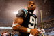 CHARLOTTE, NC - JANUARY 10: Julius Peppers #89 of the Carolina Panthers walks off the field in the rain after being defeated by the Arizona Cardinals 33-13 in the NFC Divisional Playoff Game on January 10, 2009 at Bank of America Stadium in Charlotte, North Carolina. (Photo by Streeter Lecka/Getty Images)