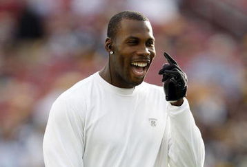TAMPA, FL - FEBRUARY 01:  Wide receiver Anquan Boldin #81 of the Arizona Cardinals smiles on the field as he warms up against the Pittsburgh Steelers during Super Bowl XLIII on February 1, 2009 at Raymond James Stadium in Tampa, Florida.  (Photo by Streeter Lecka/Getty Images)