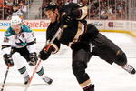 ANAHEIM, CA - OCTOBER 17:  Ryan Getzlaf #15 of the Anaheim Ducks shoots the puck in front of Patrick Marleau #12 of the San Jose Sharks during the third period at the Honda Center on October 17, 2008 in Anaheim, California.  (Photo by Harry How/Getty Images)