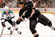 ANAHEIM, CA - OCTOBER 17:  Ryan Getzlaf #15 of the Anaheim Ducks shoots the puck in front of Patrick Marleau #12 of the San Jose Sharks during the third period at the Honda Center on October 17, 2008 in Anaheim, California.  (Photo by Harry How/Getty Images)