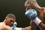 LAS VEGAS - APRIL 11:  Paul Williams (R) hits Winky Wright in the second round of their middleweight bout at the Mandalay Bay Events Center April 11, 2009 in Las Vegas, Nevada. Williams won by unanimous decision.  (Photo by Ethan Miller/Getty Images)