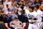 ST PETERSBURG, FL - OCTOBER 03:  Akinori Iwamura #1 of the Tampa Bay Rays celebrates with Jason Bartlett #8 after Iwamura's two run home run in the fifth inning against the Chicago White Sox in Game 2 of the American Leaugue Divisional Series at Tropicana Field on October 3, 2008 in St. Petersburg, Florida.  (Photo by Doug Benc/Getty Images)