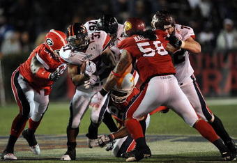 MOBILE, AL - JANUARY 24:  Running back Cedric Peerman #37 of the North team runs the ball against the South team during the Under Armour Senior Bowl on January 24, 2009 at Ladd-Peebles Stadium in Mobile, Alabama.  (Photo by Ronald Martinez/Getty Images for Under Armour)